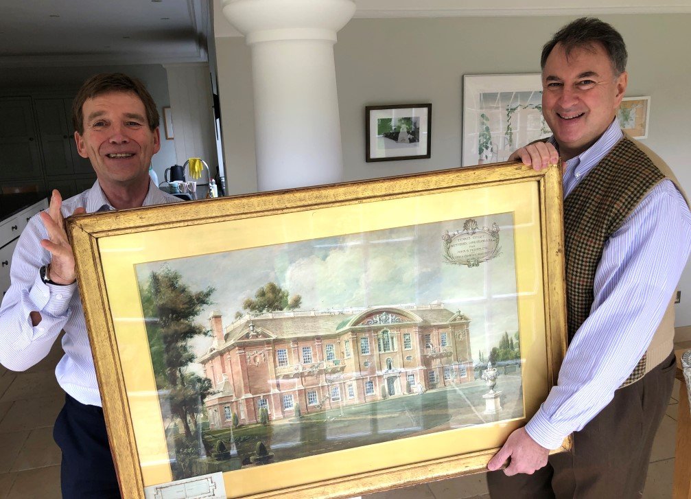 Terry Hitchens handing off his watercolor to Lloyd Zuckerberg, to prepare for shipping. Mr. Zuckerberg is Chairman of the Preservation Committee for Old Westbury Gardens.
